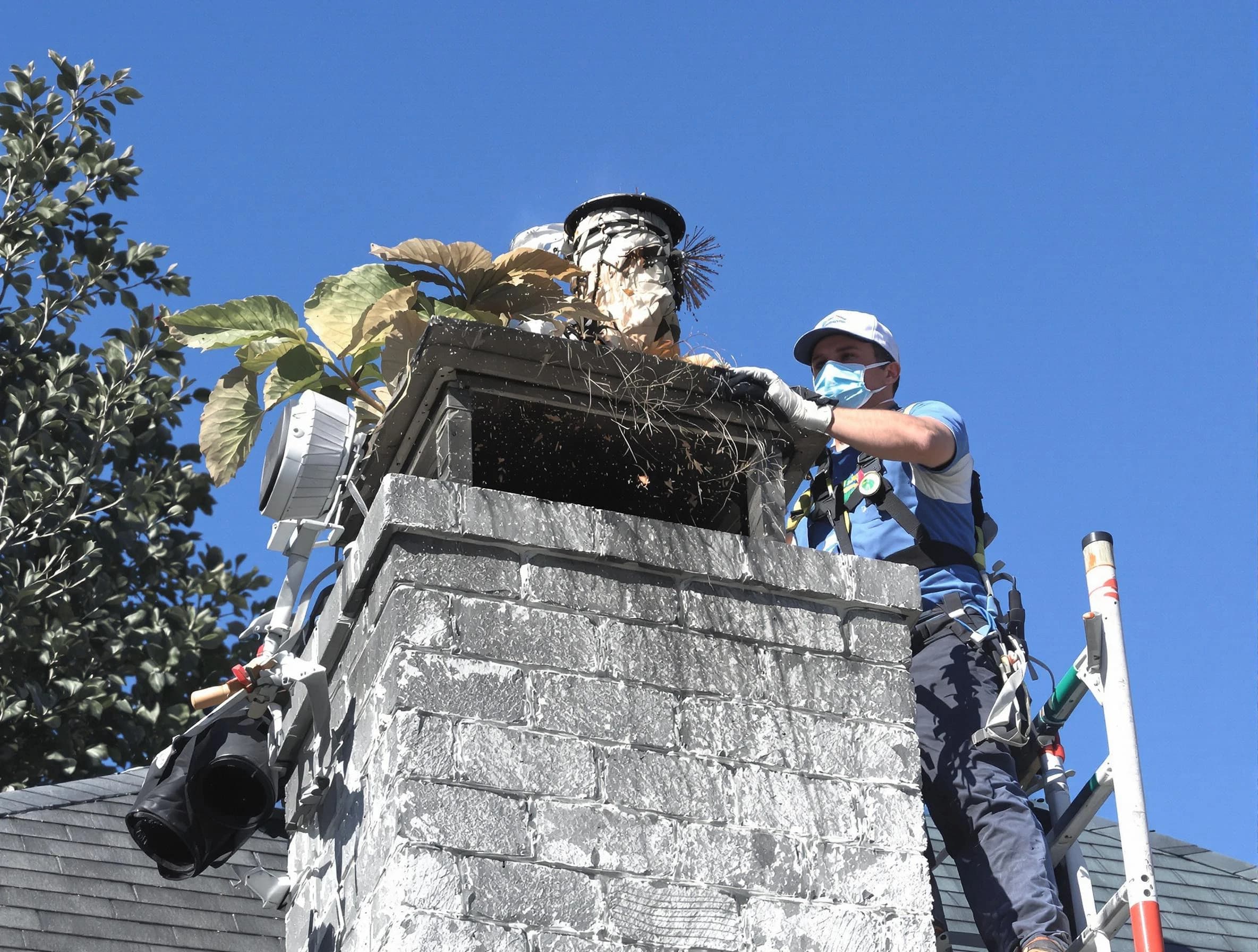 Old Bridge Chimney Sweep specialist performing chimney cleaning in Old Bridge, NJ